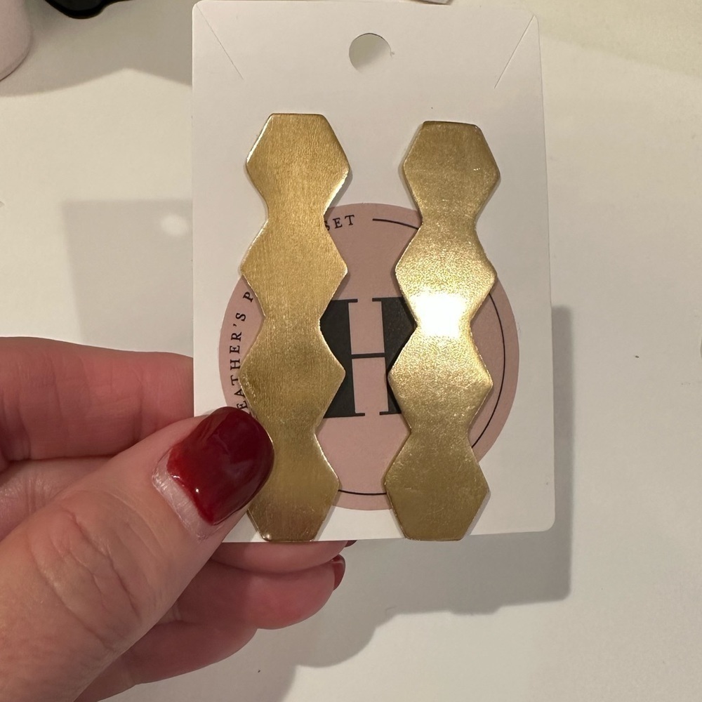 Super cool gold earrings… fun shapes. Pierced
